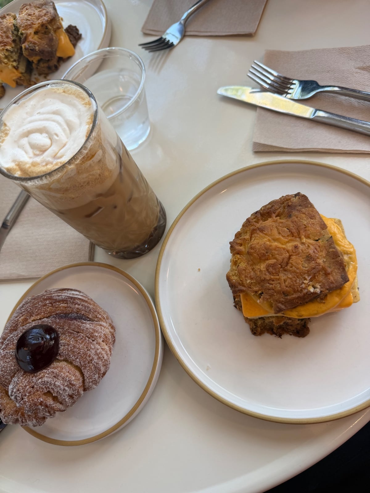 Coffee and pastries on a table at Little Loaf Bakeshop in New Paltz