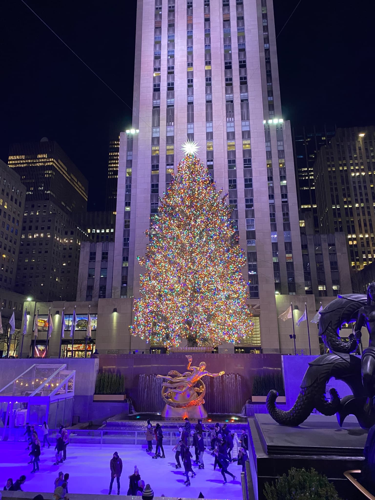 New York City illuminated at night, showing the festive season's city atmosphere