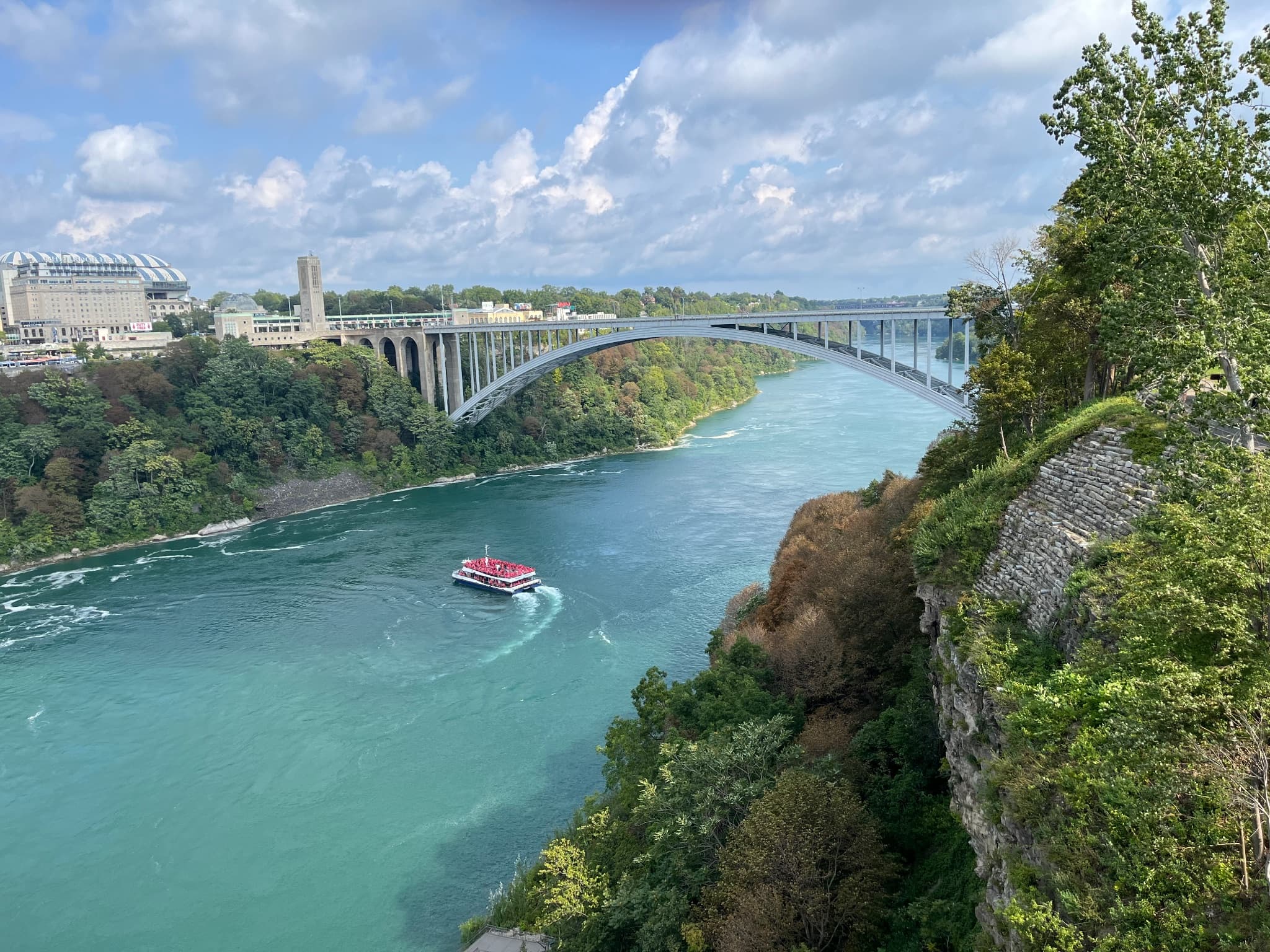Niagara River gorge with a tour boat and Rainbow Bridge