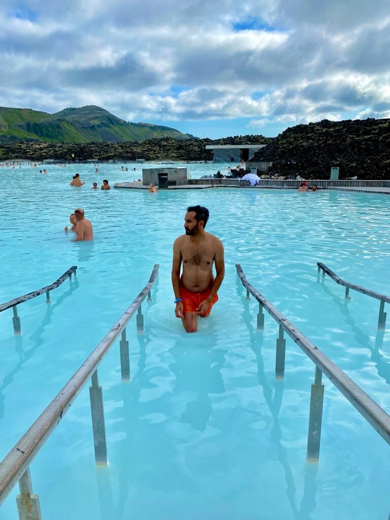 Wading into the milky blue water at the Blue Lagoon